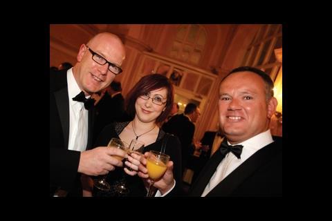 From left: BSD editor Andy Pearson, BSD reporter Krystal Sim and EMC editor Andrew Brister toast a successful evening.